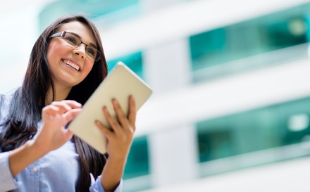 Business woman with a tablet computer