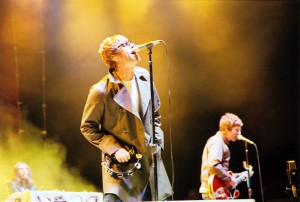 Oasis brothers Noel and Liam Gallagher performing in 2005 (Credit/source: [http://www.flickr.com/photos/freschwill/44256675/ Will Fresch])